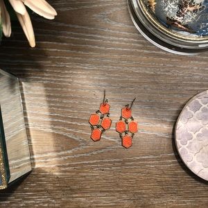 orange hexagon dangly earrings